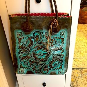 Patricia Nash tote in tooled turquoise leather